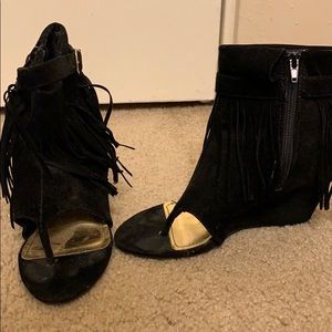 Black ankle sandals. Barely worn. Small wedge.
